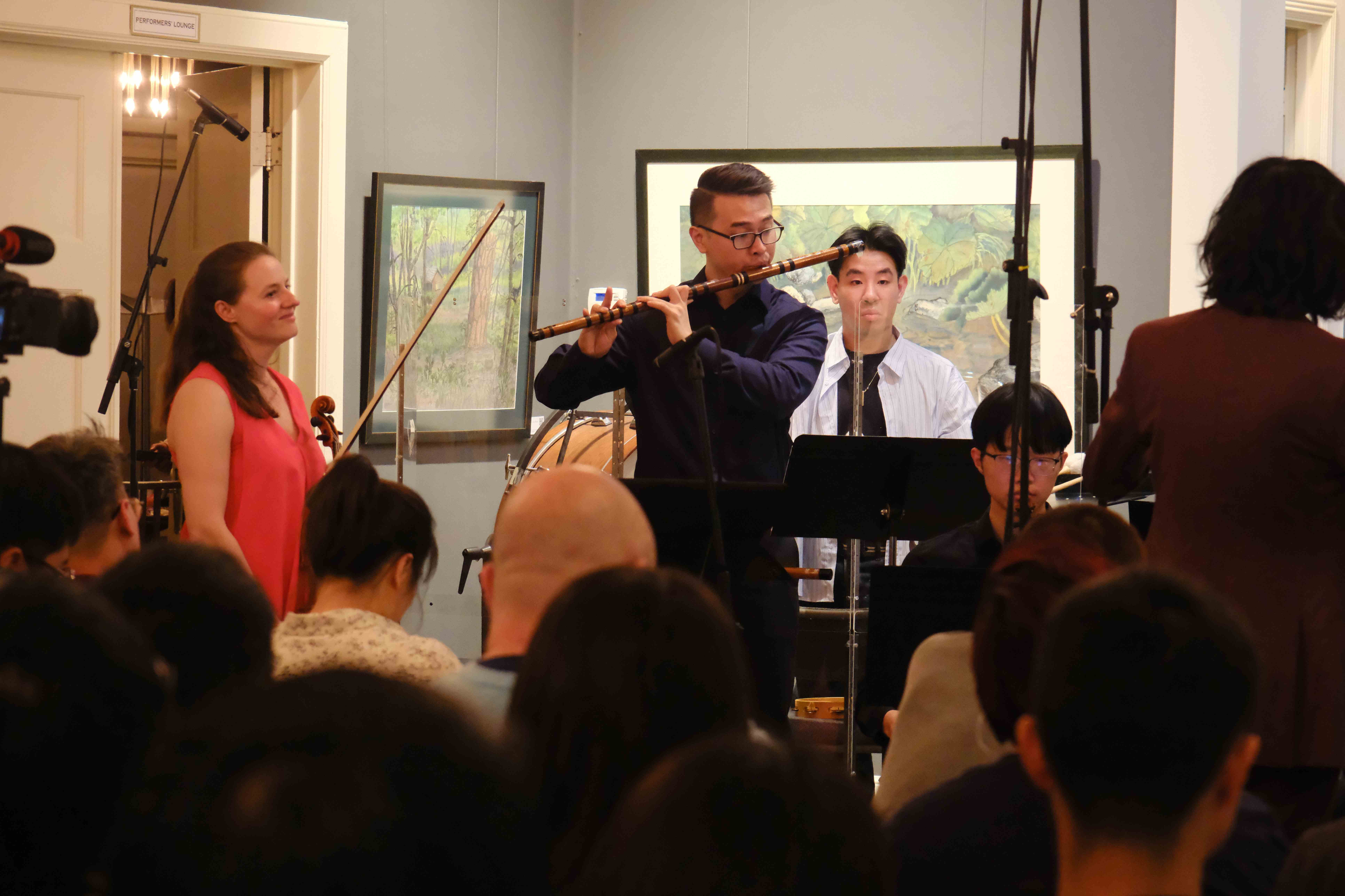 Dizi player performing traditional Chinese flute