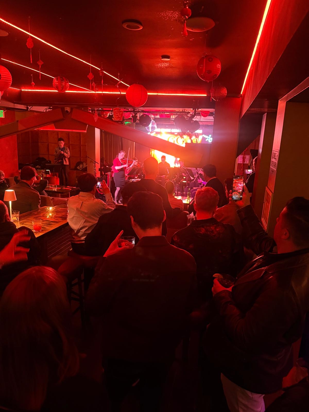Packed crowd watching the performance at the GDC private event